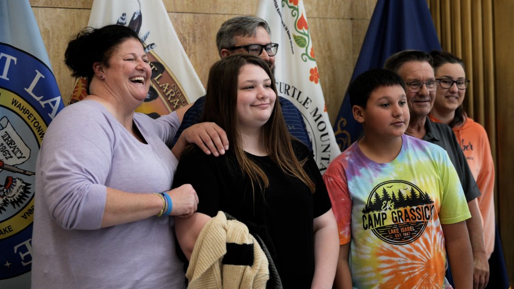 Peterson posing for a photo with her family