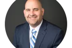 headshot of man in suit 