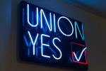 neon sign that says union yes