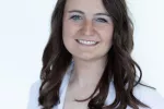 headshot of woman smiling at camera 