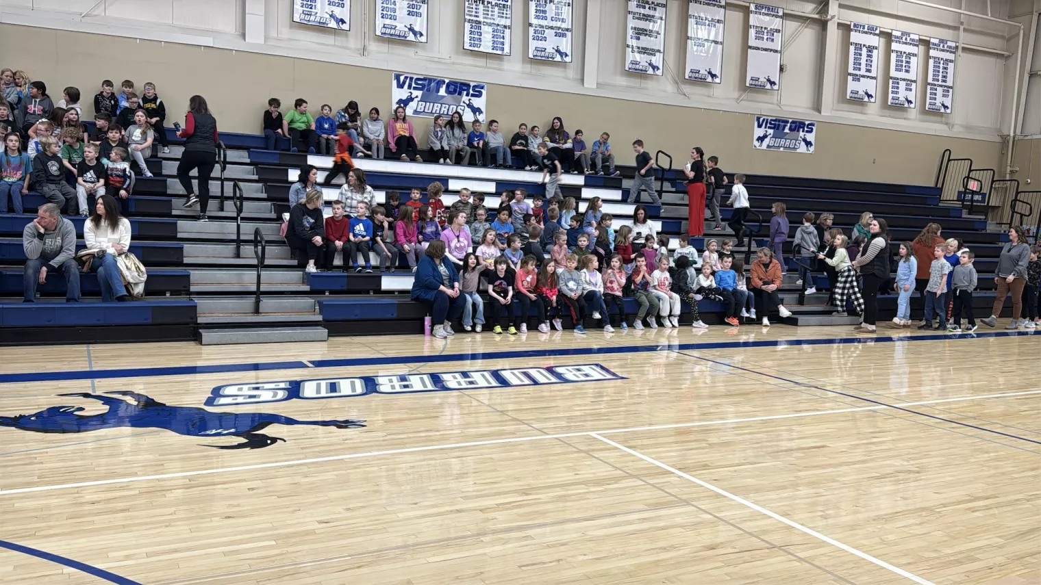 Bleachers are filled with students at Hillsboro school gymnasium for ESP of the Year finalist award ceremony.