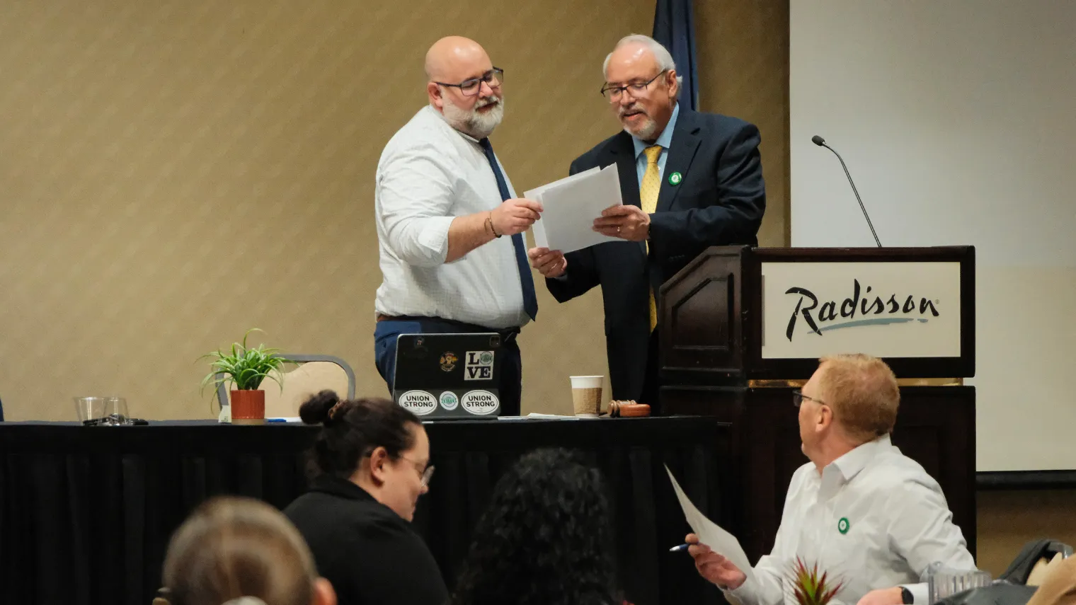 North Dakota United Executive Director Chad Oban presents information to delegates during the 2026 Delegate Assembly.