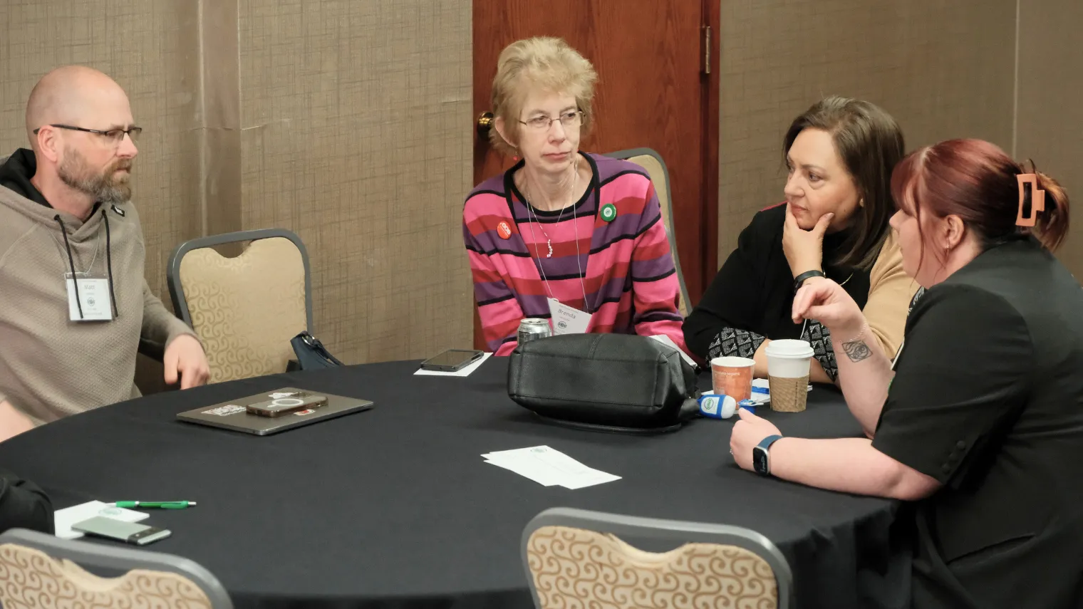 Delegates participate in a small-group discussion during an afternoon training session at the 2026 North Dakota United Delegate Assembly.