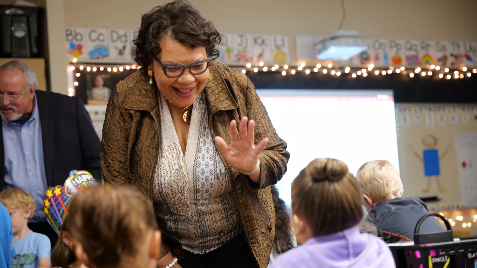 NEA vice president visiting elementary students in classroom
