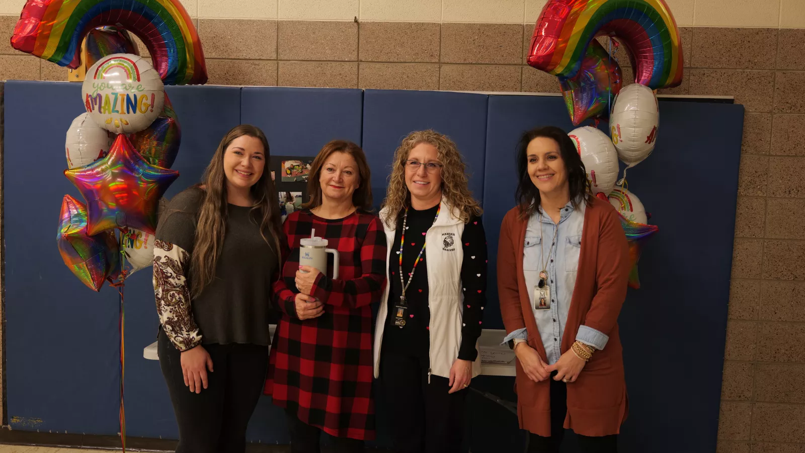 Laurie stands with colleagues at her nomination celebration