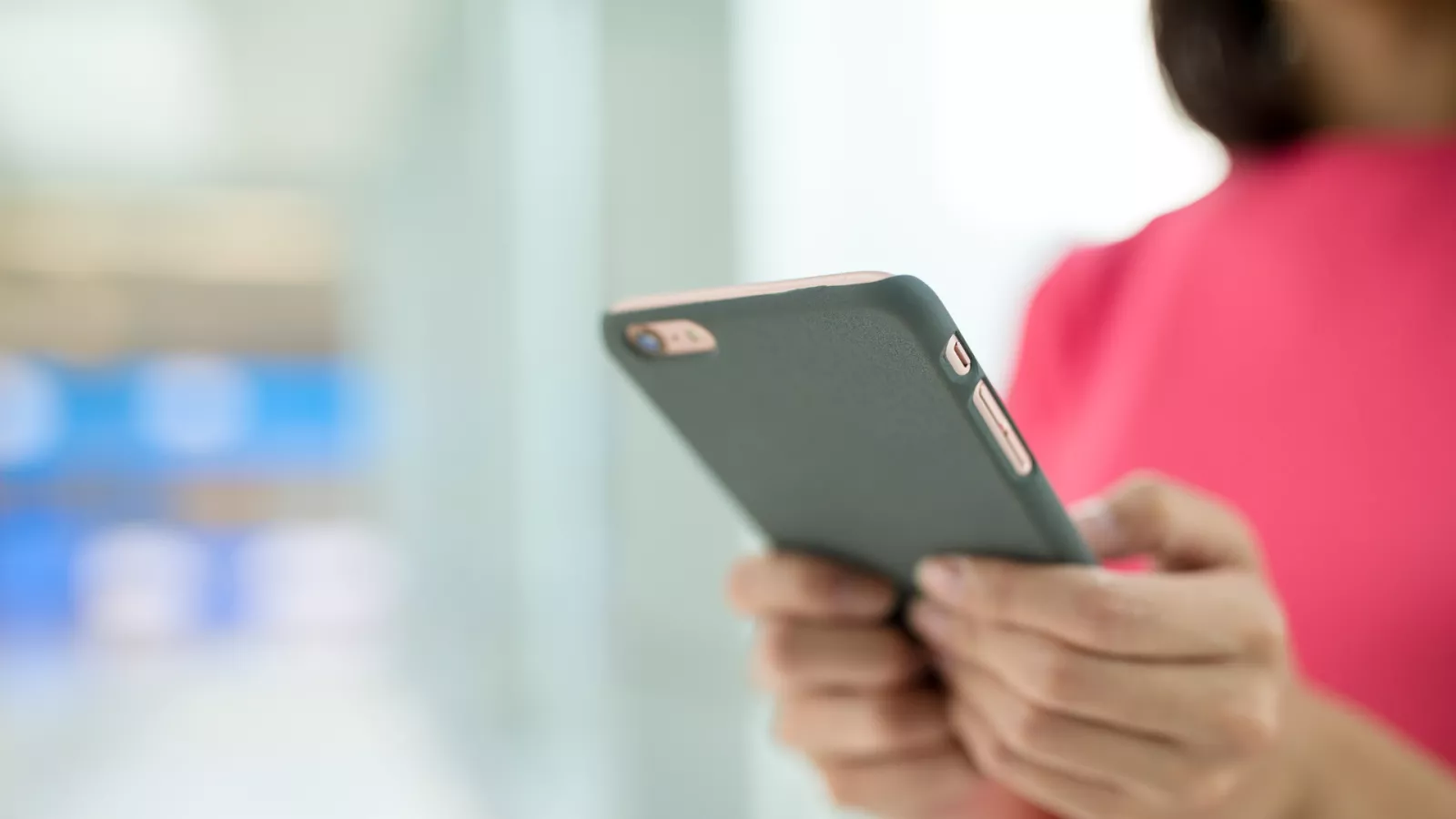 close up of a woman using a cell phone