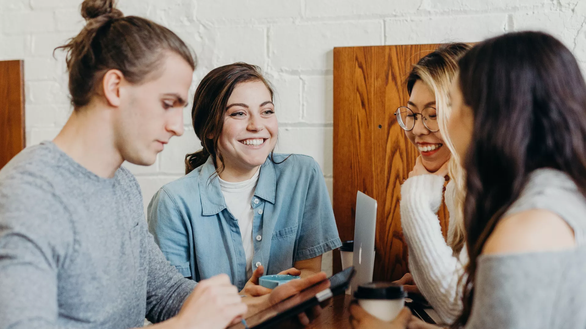 group of college student working at a table