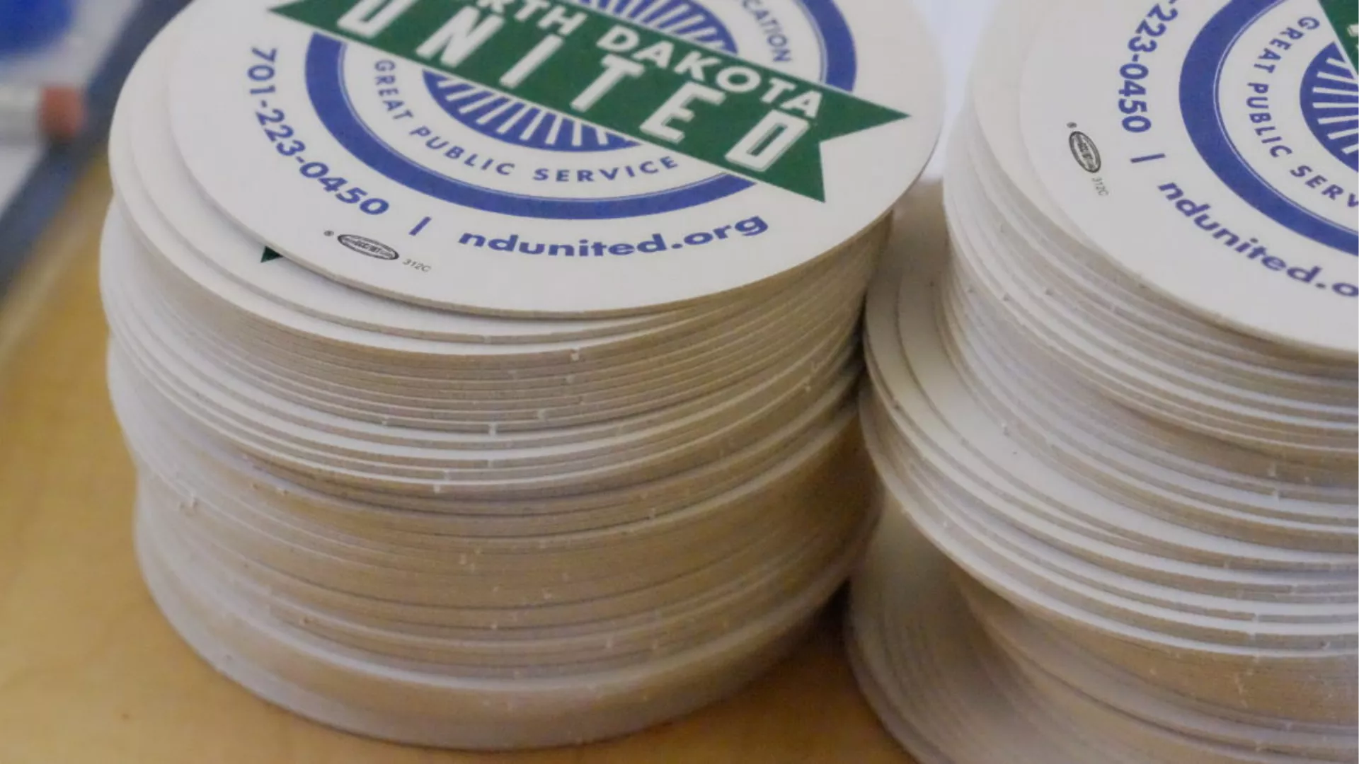 stack of ndunited coasters