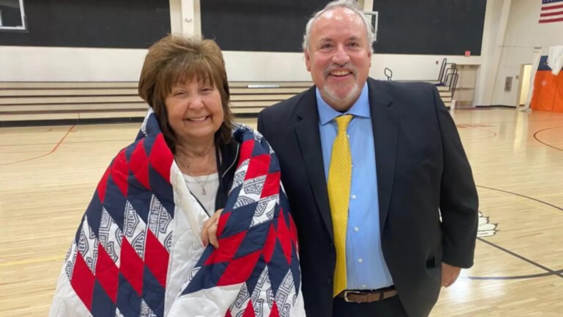 woman wearing blanket around her shoulders