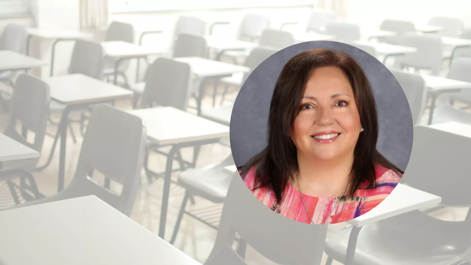 headshot of woman with dark brown hair