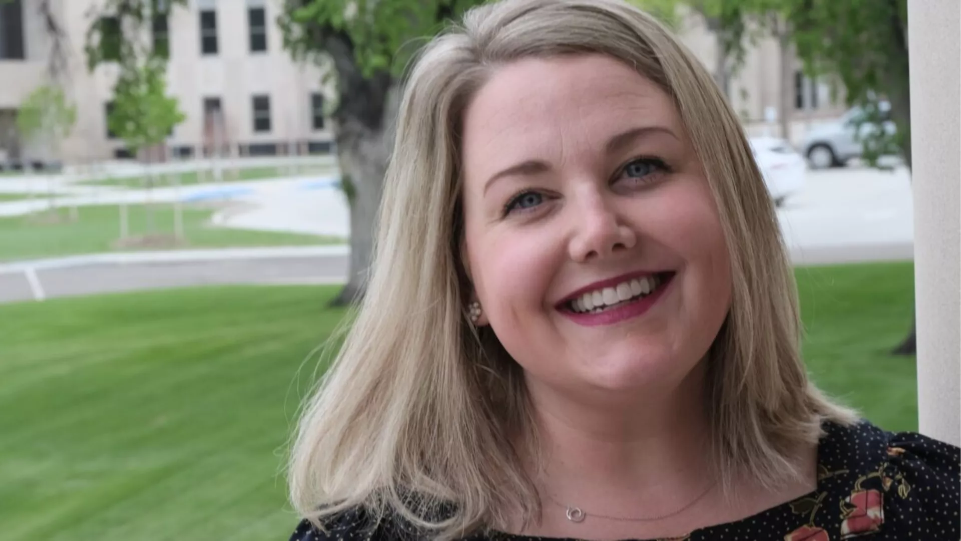 close up image of woman standing outside