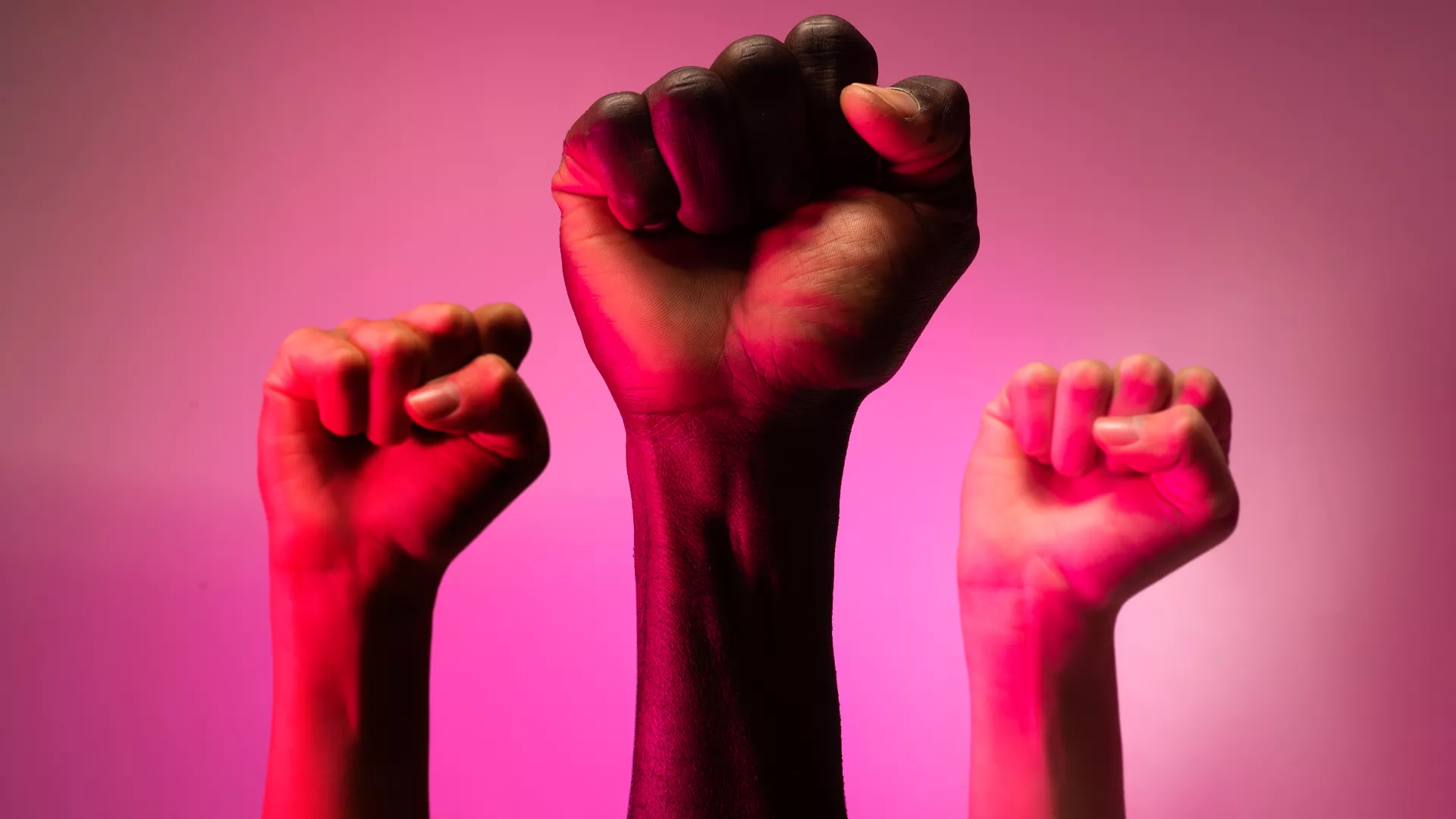 hands in the air making fists