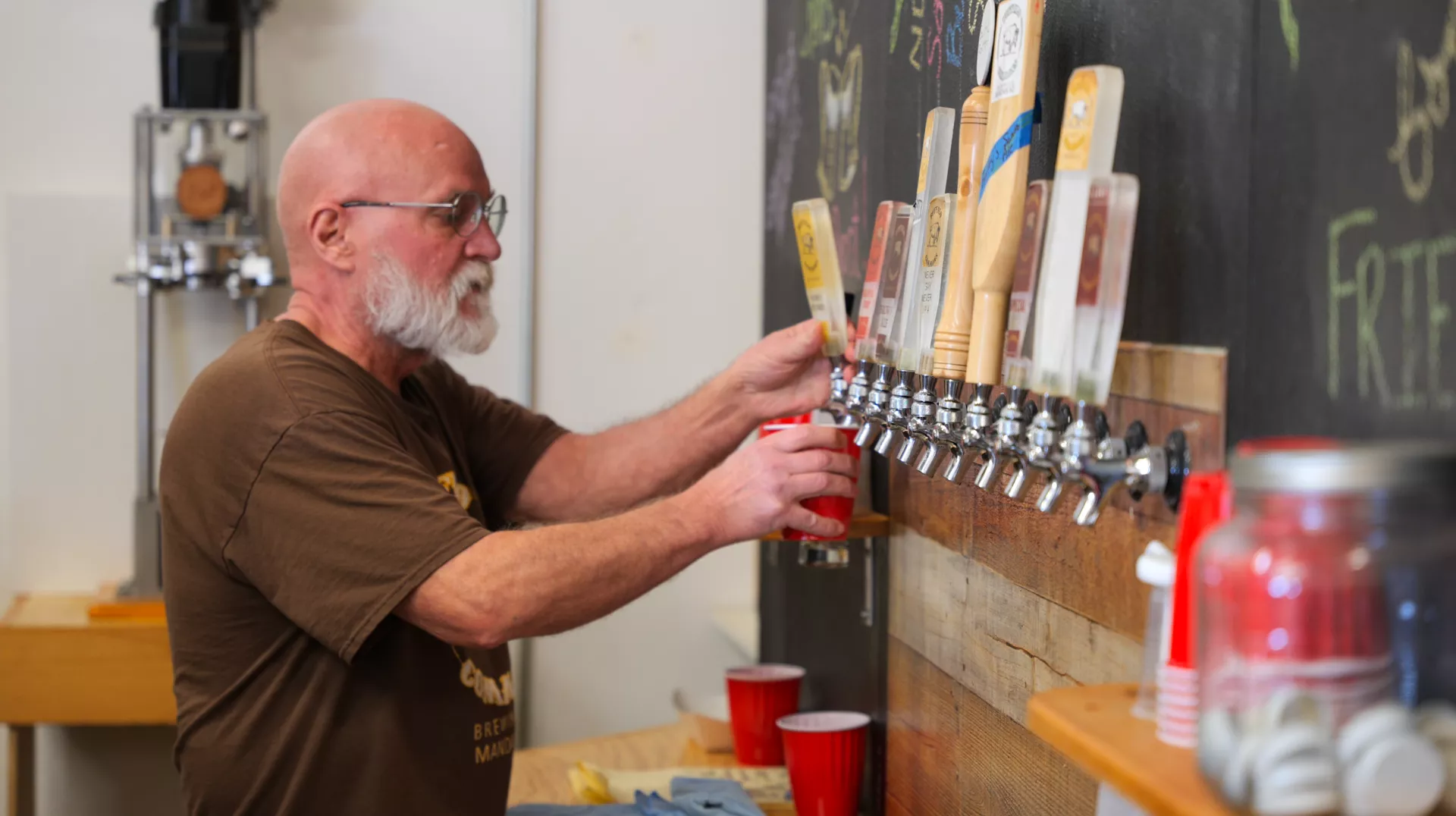 Bartender pouring beer