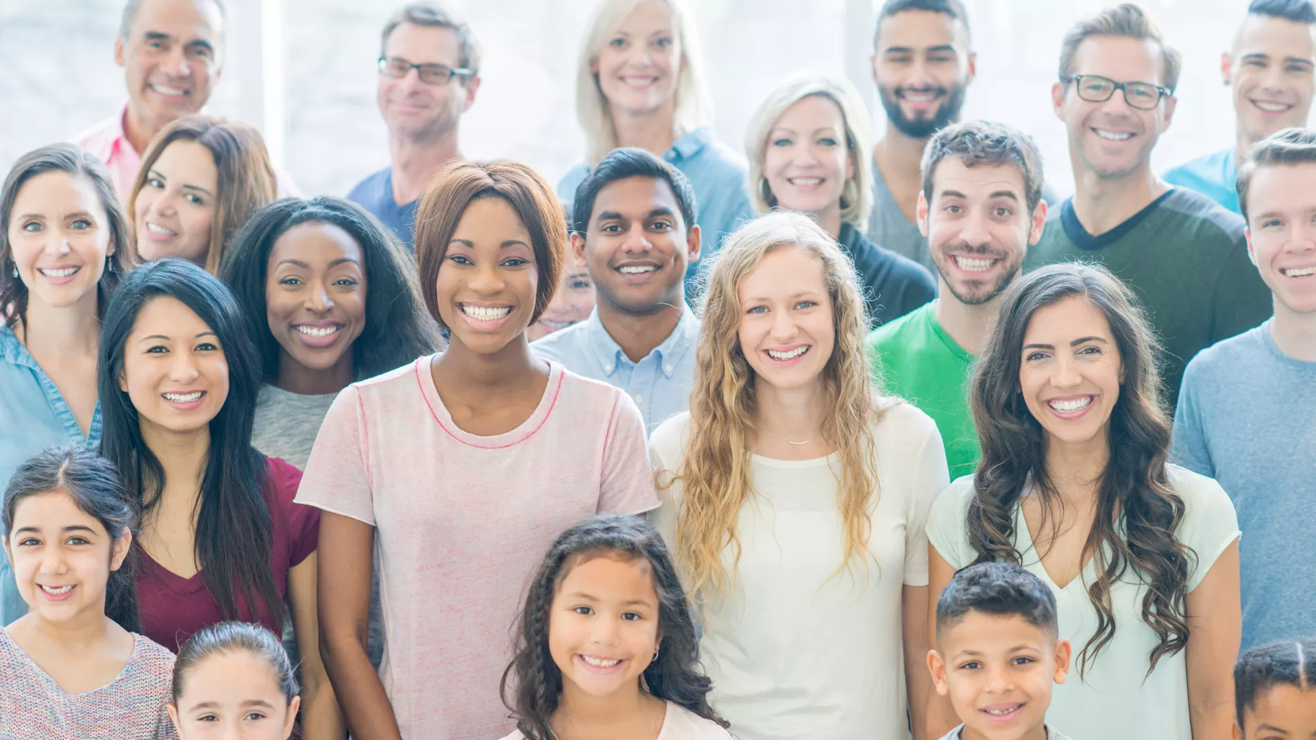 group of people smiling for a photo