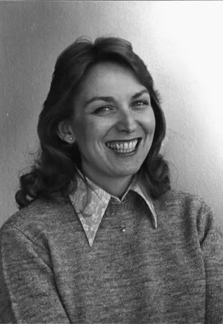 black and white photo of woman in the 1980s