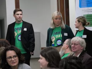 Group of NDU working talking at the capitol