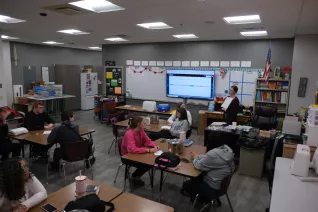 image of classroom with students sitting at desks