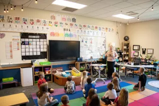 A teacher in a classroom with students