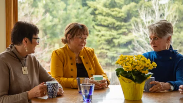 group of retired educators having coffee