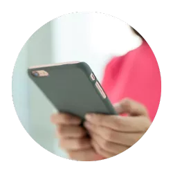 close up of a woman using a cell phone