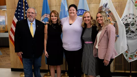 Nick Archuleta, Megan Wasness, Sheila Peterson, Trisha Schaefer, and Andee Mattson pose for a photo